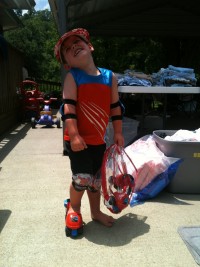 Three-year-old Jay sporting his spider-man roller gear and "new" sun visor